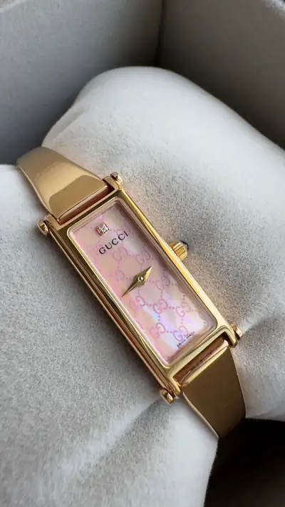 ساعة غوتشي ذهبية بسوار بنغل 4