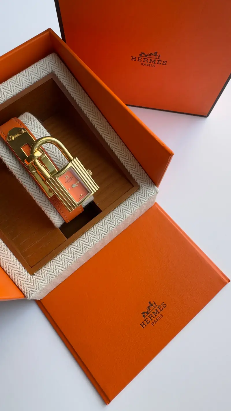 Hermès Kelly Watch with Orange Leather Strap