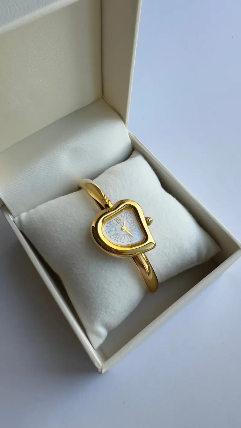 Yves Saint Laurent Heart-Shaped Gold-Tone Bangle Watch