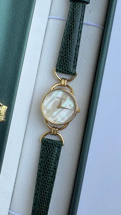 Gucci Mother-of-Pearl Round Watch with Green Strap 4